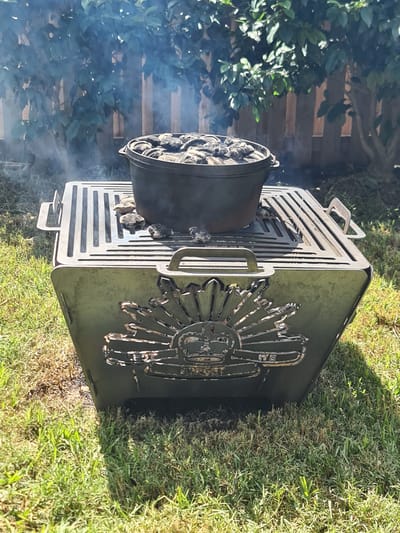 Custom fire pit with decorative plasma cut design